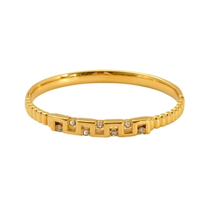 Bracelet jonc en acier titane doré avec motifs géométriques et cristaux étincelants