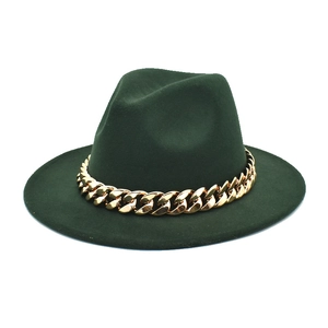 Close-up of dark green wool fedora hat with a thick gold chain decorative band
