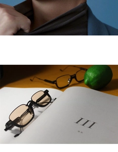 Detail of retro square semi-rimless sunglasses with black frame and light amber lenses