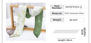 Detail of 86x6cm green fruit print twilly scarf in 100% polyester fabric material