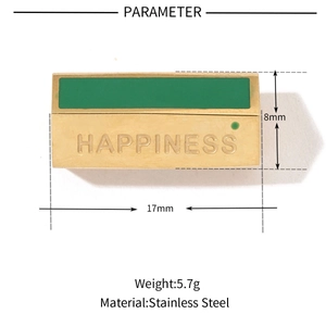Détail d'un charme en acier inoxydable avec insert vert et mesures du produit