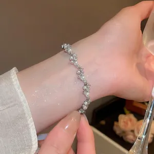 Elegant zircon pearl wrap bracelet with silver rhinestones on a woman's wrist