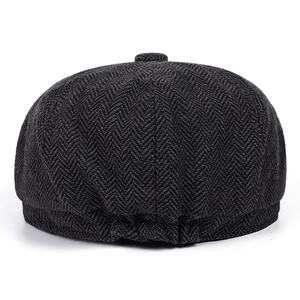 Classic dark grey herringbone newsboy cap with elastic back and vintage British style
