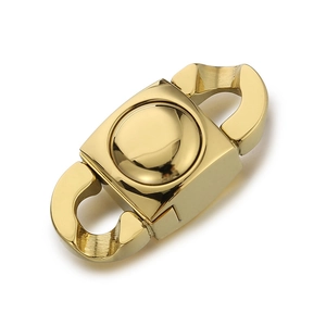 Single polished gold stainless steel clasp for DIY necklaces or bracelets on white background
