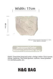 Quilted shell cosmetic bag detail with size marks of 17cm wide and 14cm high