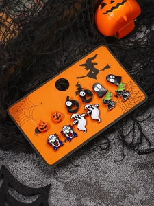 Detail of 6 pairs Halloween stud earrings featuring pumpkin ghost and clown motifs