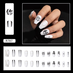 Short ballerina press-on nails in black and white with Chinese characters and gold glitter