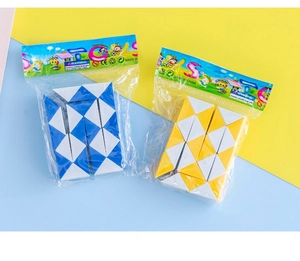 Detail view of colorful snake cubes in retail packaging with blue and yellow patterns