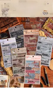 Detail of vintage PET scrapbook stickers with English typography on retro background