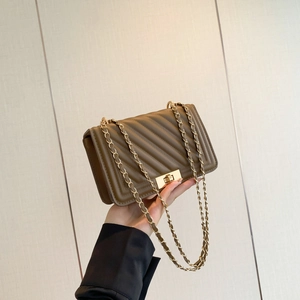 Brown V-quilted faux leather crossbody bag with gold square twist lock and chain strap