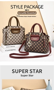 Detail of luxury printed handbags with heart pendants and adjustable shoulder straps