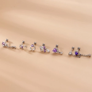 7-piece set of silver stainless steel studs with purple and clear zircon stones