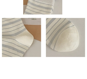 Close-up of striped cotton socks showing knitted texture, heel, and toe craftsmanship