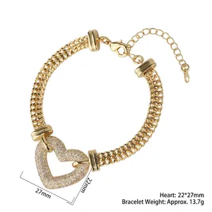 Golden double-layered chain bracelet with a sparkling zircon hollow heart pendant