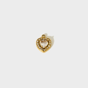 Gold-plated stainless steel heart pendant with sparkling cubic zirconia crystals on white background