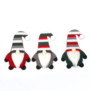 Three-piece set of knitted Christmas gnomes in red, green, and gray festive stripes