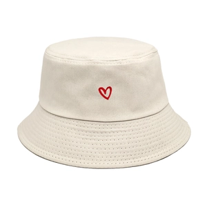 Minimalist cotton bucket hat in cream white featuring a red heart embroidery design