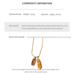 Detailed view of PiXiu pendant necklace featuring copper and sparkling zircon stones