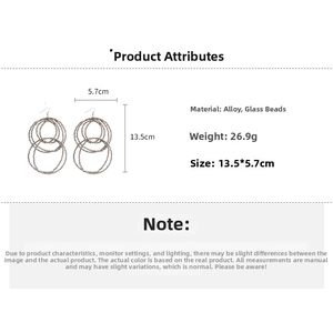 Detailed view of large multi-layer interlocking glass circle earrings with size specs