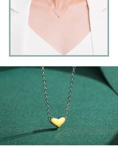 Detail of a minimalist gold heart pendant with a silver chain shown on model and close-up