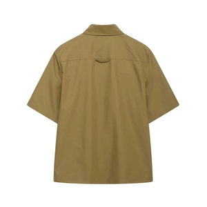 Rear view of khaki short-sleeved utility shirt showing clean cut and yoke details