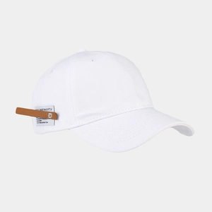 Detail view of white canvas baseball cap featuring brown leather strap and silver buckle