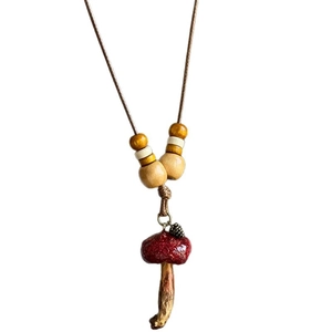 Creative handmade mushroom pendant necklace with wooden beads and brown cord chain for women