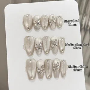 Unghie Finte Fatte A Mano Occhio Di Gatto Bianco Perla Artificial Farfalla Strass Glitter Eleganti