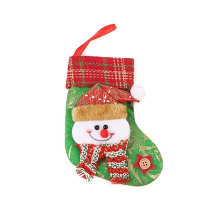 Green Christmas stocking with snowman 3D plush character and plaid cuff decoration