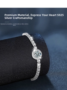 Macro detail of S925 sterling silver bracelet with a brilliant round moissanite center stone