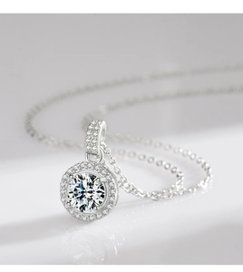 Macro shot of S925 sterling silver halo necklace with brilliant round-cut zircon stone