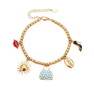 Pulsera de cuentas de acero inoxidable dorado con dijes de océano y medidas detalladas