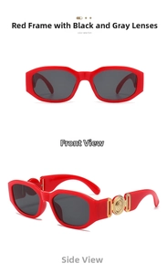 Close-up of red retro sunglasses featuring golden embossed round metal temple ornaments