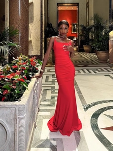 Elegant red off-shoulder backless bodycon maxi dress for women in a luxury hall