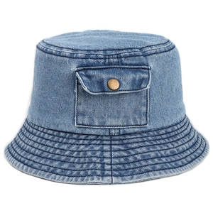 Vintage blue washed denim bucket hat with decorative front pocket and brass button
