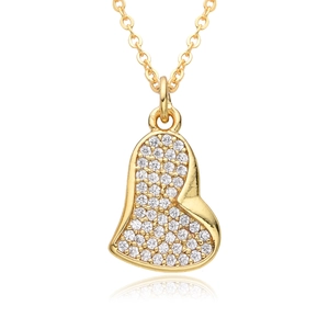 Detail of gold heart pendant with micro-pave white zircon inlay and polished chain