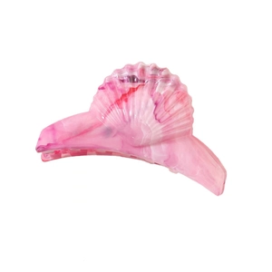 Detail of large pink marble shell hair claw clip made of premium acetate material