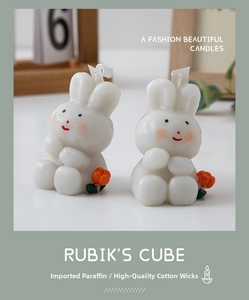 Detailed close-up of handmade rabbit candles with cotton wick and premium paraffin wax