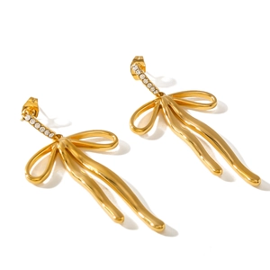 18k gold plated stainless steel bow earrings with zircon tassels on white background