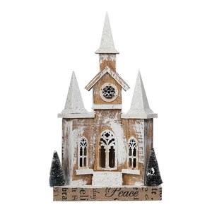 Retro wooden Christmas church figurine with Peace engraving and snow-covered pines
