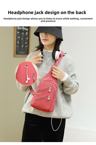 Detail of pink nylon crossbody bag showing the functional metal earphone jack on top