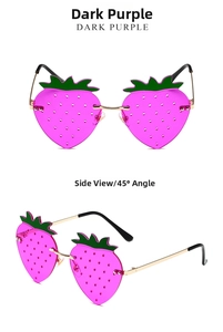 Detail showing frameless strawberry sunglasses with dark purple lenses and gold metal temples