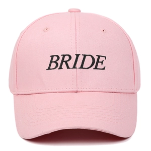 Pink cotton baseball cap with black Bride embroidery in center for women