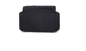 Detail view of the wide flat bottom on this durable black nylon backpack for women