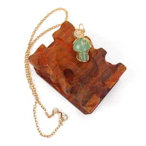 Handmade gold wire wrapped green crystal mushroom pendant necklace with a fine gold chain