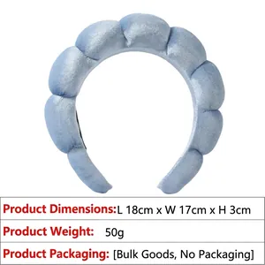 Detailed view of light blue padded velvet headband with dimensions 18x17x3cm and 50g weight
