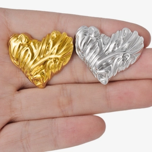 Irregular textured heart stud earrings in 18k gold and silver stainless steel