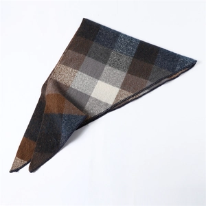 Detail shot of winter scarf showing colorful block pattern and durable stitched edges