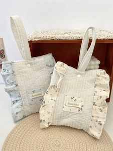 Quilted floral handbag with ruffle edge and resin snap button closure in fresh style