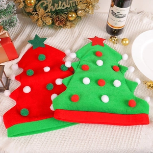 Christmas tree shaped party hats in red and green felt with colorful pom poms and star toppers